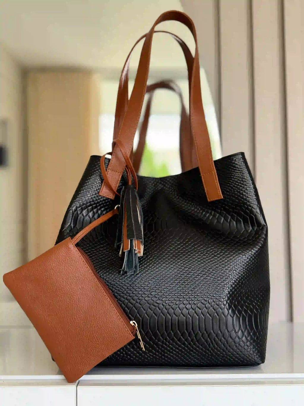 Cartera en cuero con monedero