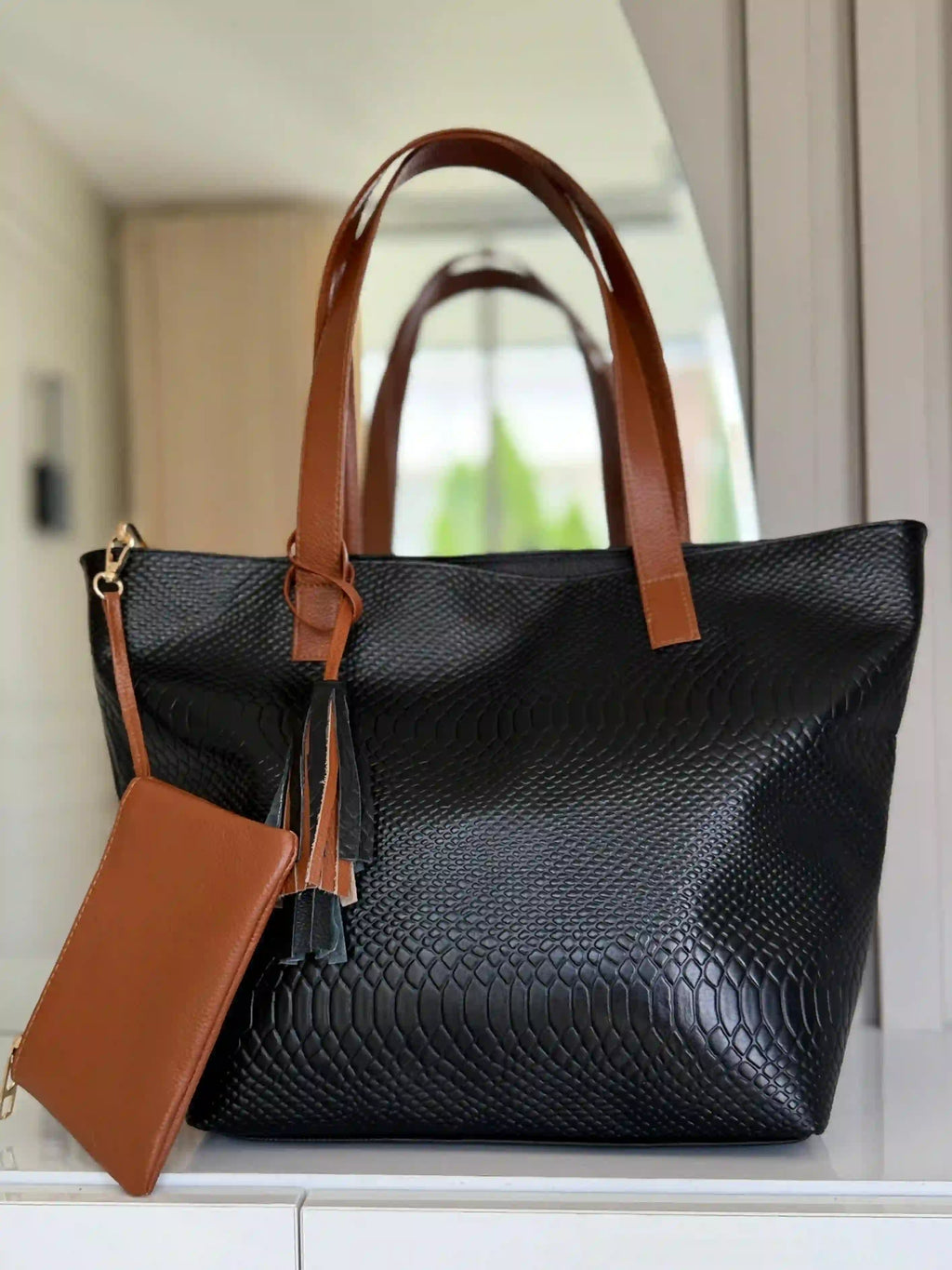 Cartera en cuero con monedero