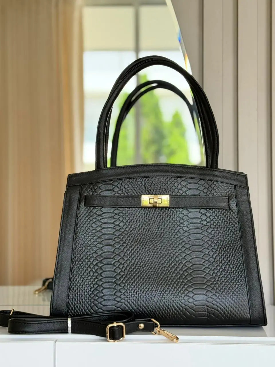 Cartera en cuero Gaia